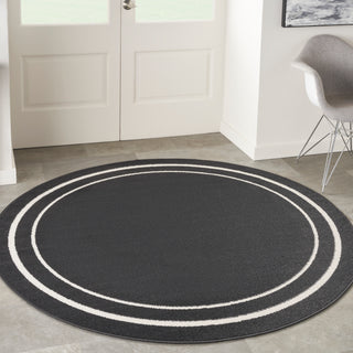 The Rug Corner Nourison Home Nourison Home - Nourison Essentials Black/Ivory Area Rug NRE02  
